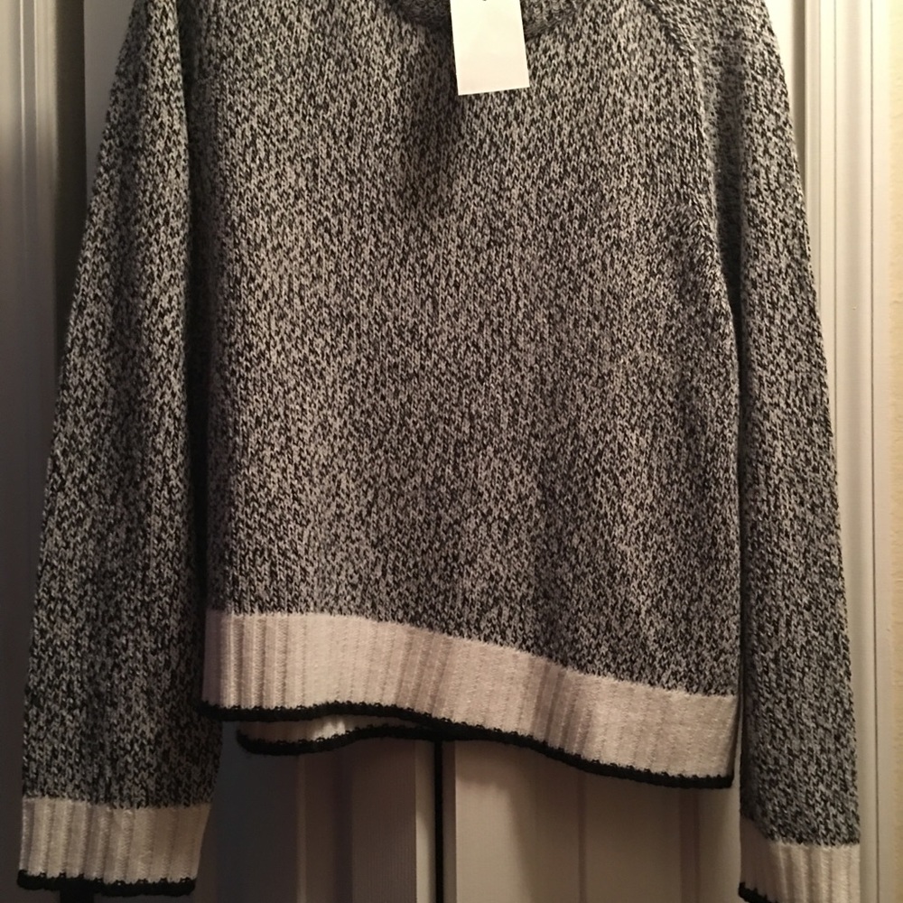 Cropped black and white sweater